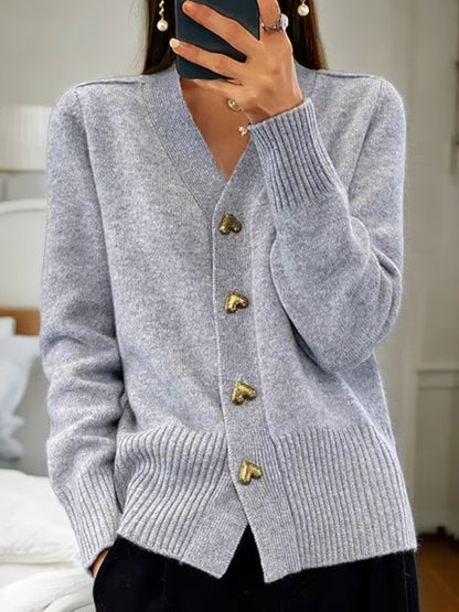Luane – elegante cardigan met hartjesknopen